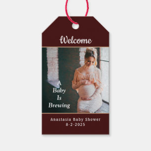 Ett Baby håller på att blåsa fotoutforskaren Party Presentetikett