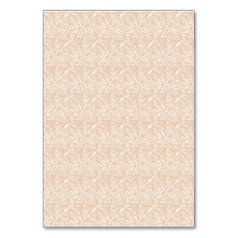 Ett brunt matta med en hård motiv ljuger på fl bordsnummer