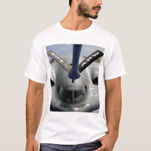 Ett flygplan för ande som B-2 in får, placerar T-shirt