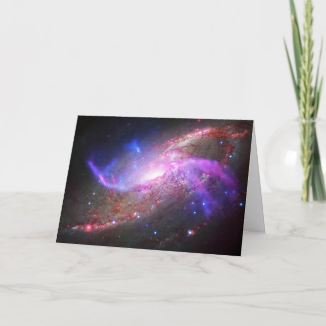 Ett galaktiskt ljusspel i Spiral Galaxy NGC 4258. Kort (Framsida)