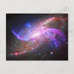 Ett galaktiskt ljusspel i Spiral Galaxy NGC 4258. Vykort