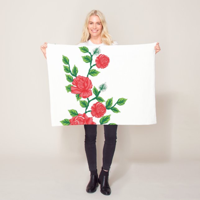 Ett gäng röda blommor på vit bakgrund fleecefilt (På plats)