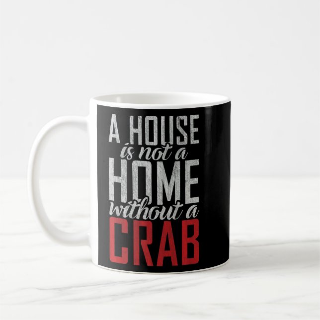 Ett hus är inte ett hem utan en Crab-ägare Kaffemugg (Vänster)