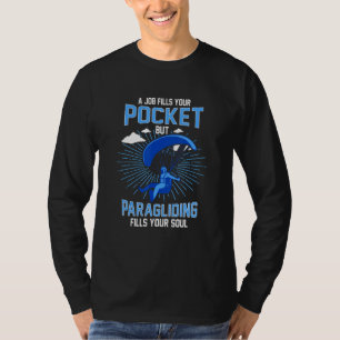 Ett jobb fyller din ficka men paragliding fyller d t shirt