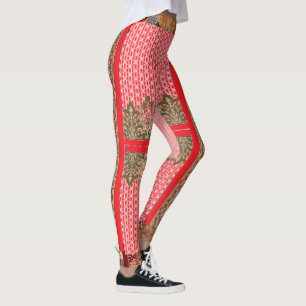 ett kor-stygn mönster med rött gräns leggings