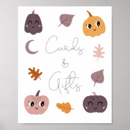 Ett litet par babyskjortor och gåvor poster