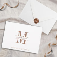 Ett Monogram minimalistiskt, enkelt brunt och vitt