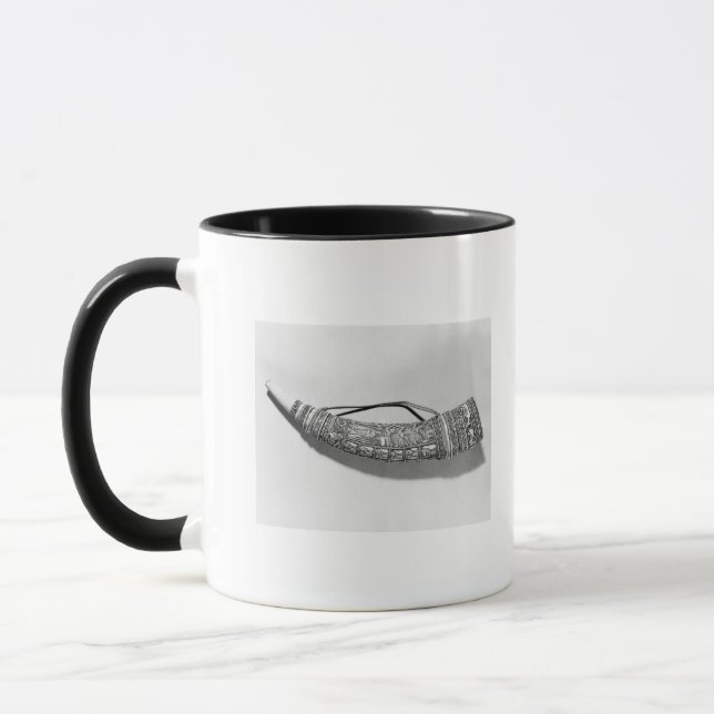 Ett oliphant mugg (Vänster)