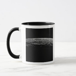 Ett overkligt landskap av Saturns måne Mugg