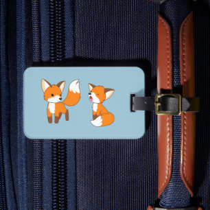 Ett par Cute Little Fox på Blue Bagagebricka