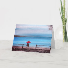 Ett par i kärlek med röda paraplyer kort