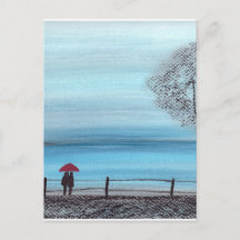 Ett par i kärlek med röda paraplyer