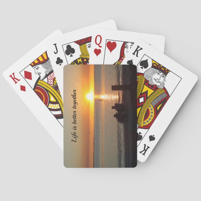 Ett par sittplatser på stranden vid uppspelningsko casinokort (Baksidan)