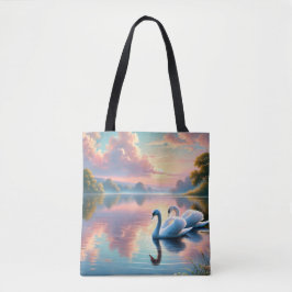 Ett par svanar glider på en serene sjö tygkasse