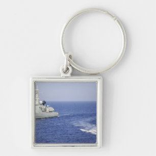 Ett portugisiskt marinlag i ett uppblåsbart farty fyrkantig silverfärgad nyckelring