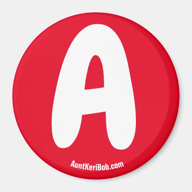 Ett rött kylskåp magnet (Framsidan)