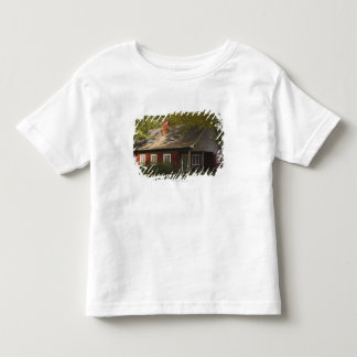 Ett rött loggar hem t-shirt