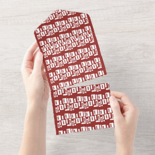 Ett rött matta med ett texturerat mönster sprids u