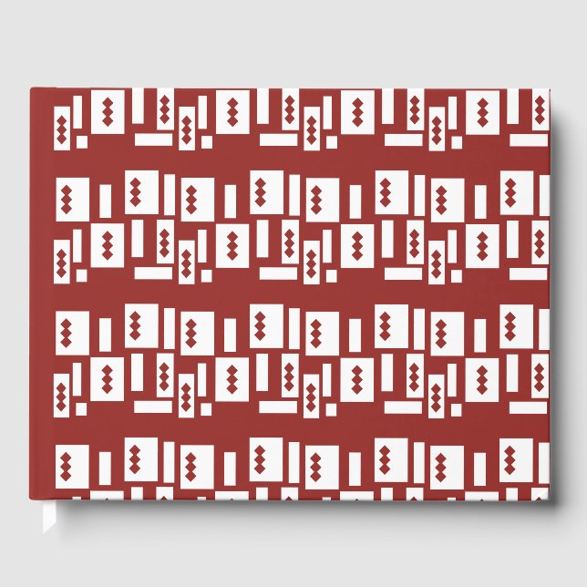 Ett rött matta med ett texturerat mönster sprids u gästböcker (Framsida)