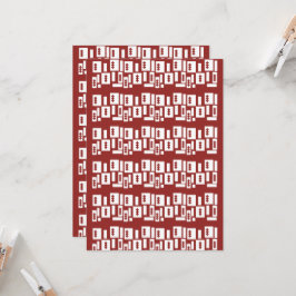 Ett rött matta med ett texturerat mönster sprids u inbjudningar