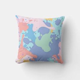 Ett rött mönster av färgfläckar kudde