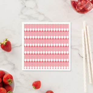 Ett rött och rosa geometriskt mönster med interlo pappersservett