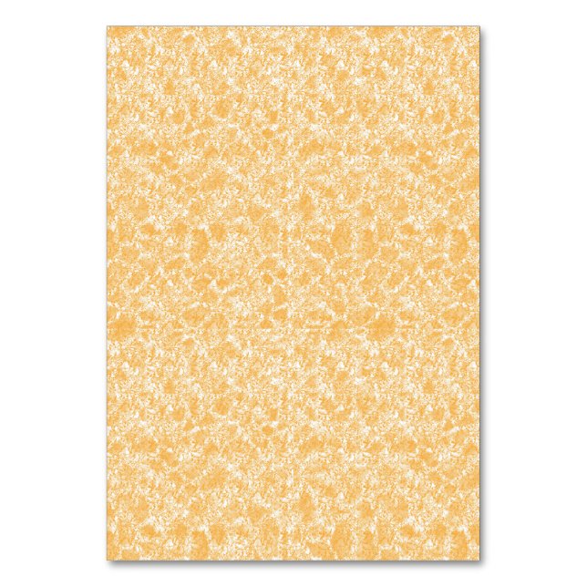 Ett runt matta med en pulserande blandning av gult bordsnummer (Framsidan)