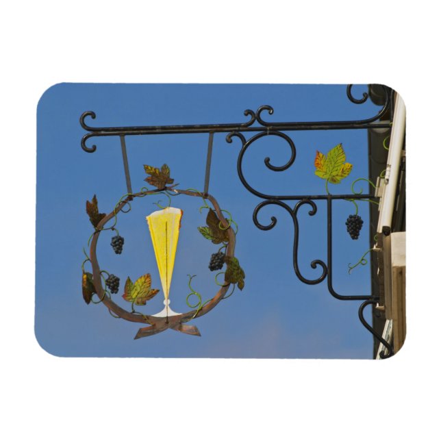 Ett skrivtecken från järn som illustrerar temat magnet (Horisontell)