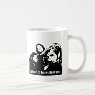 Ett ställe som begraver främlingvektormuggen kaffemugg