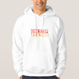 Ett steg i taget – Inspirerande framstegscitat Hoodie