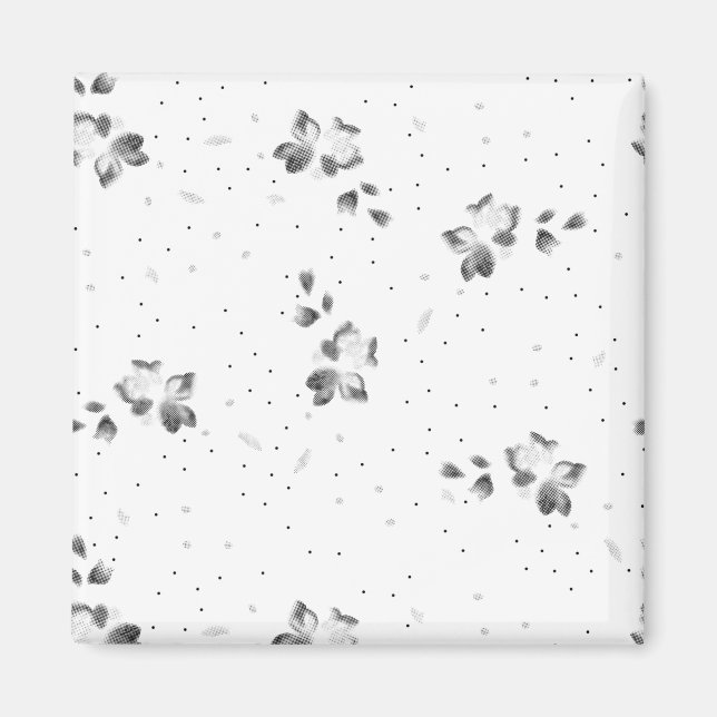 Ett svart och vitt foto av ett gäng punkter magnet (Framsidan)