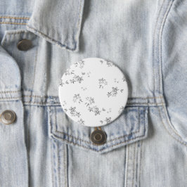 Ett svart och vitt foto av snö flingor knapp