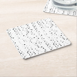 ett svartvitt foto av regndroppar underlägg papper kvadrat