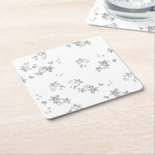 ett svartvitt foto av snöflingor underlägg papper kvadrat