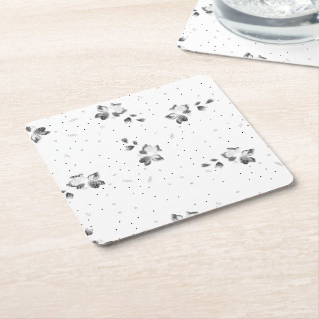 ett svartvitt foto på en massa prickar underlägg papper kvadrat (Vinklad)