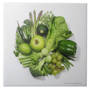 Ett val av gröntfrukter & vegetables. kakelplatta