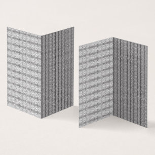 Ett vitt och grått-geometriskt mönster fyller bild kort