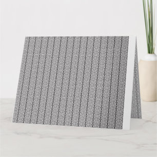 Ett vitt och grått-geometriskt mönster fyller bild kort