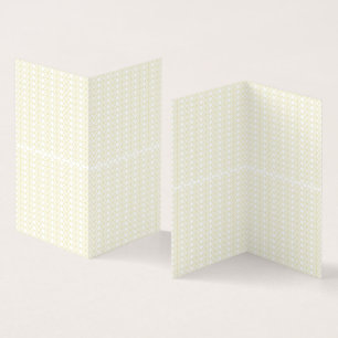ett vitt och guld-geometriskt mönster kort