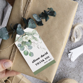 Eucalyptus gren vita blommor typografi bröllop presentetikett