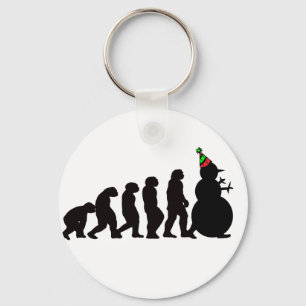 Evolution av snögubben, rolig vinterdräkt och nyckelring