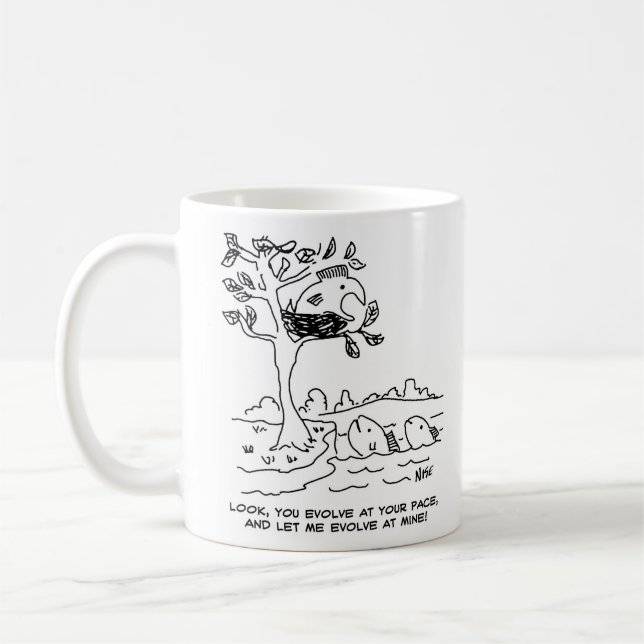Evolution-teori. Fisk i ett bo Kaffemugg (Vänster)