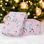 Exemplet Cute vinterpingguin igloos snö Presentpapper<br><div class="desc">Lägg dina gåvor i stil i kanten med vår Chillin med Baby Penguin-temat Wrapping Papper! Den här fantastiska pappra färgen har snygga, handmålade penguiner, igloos och snöflingor på isigens blå bakgrund och baksida av rosa. Oavsett om det är en babydusch eller ett vintertemat firande, kommer presenter att se extra speciellt...</div>