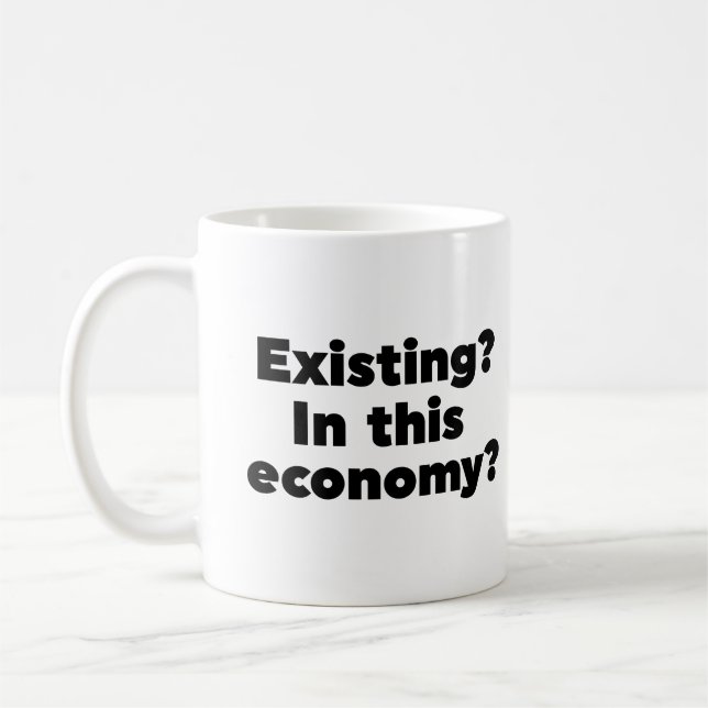 Existerar? I denna ekonomi? Kaffemugg (Vänster)