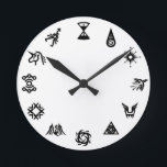 EXO symbolklocka Rund Klocka<br><div class="desc">Koreas hetaste nybörjargrupp, EXO, har tolv medlemmar, var och en med sin egen symbol speciell "supermakt" och motsvarande symbol. Med tolv timmar på en dag och tolv medlemmar i gruppen (och Taos makt som Time Control) är de perfekten lämpade för en K-pop-temad klocka! Du kan äntligen säga "Kai-minuter förbi Kris"...</div>