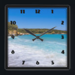Exotic Beach Tropical Island Paradise Fyrkantig Klocka<br><div class="desc">En klocka med ett fotografi som visar en strand på den grekiska ön Kreta. En vacker tropiska blå strand med skummig surfa. Underbart stillastående resmål.</div>