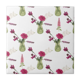 Exotisches Blumenarrangement im Glas Kakelplatta