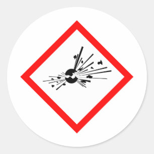 Explosivt varningstecken runt klistermärke