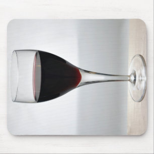 Exponeringsglas av rött vin musmatta