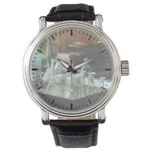 Exponeringsglas kanaliserar och flaskor armbandsur